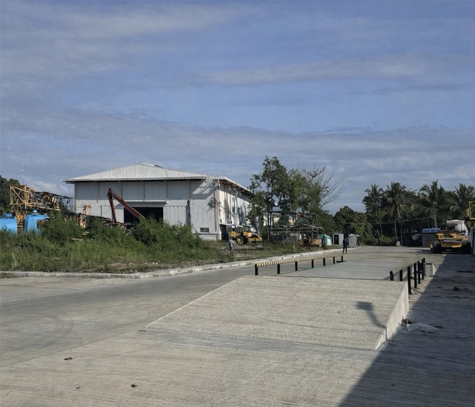 On-site truck scale and warehouse access road